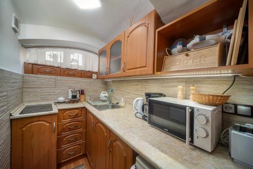 Kuchyň nebo kuchyňský kout v ubytování Kordé Apartman