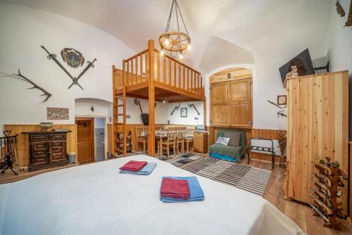 Postel nebo postele na pokoji v ubytování Kordé Apartman