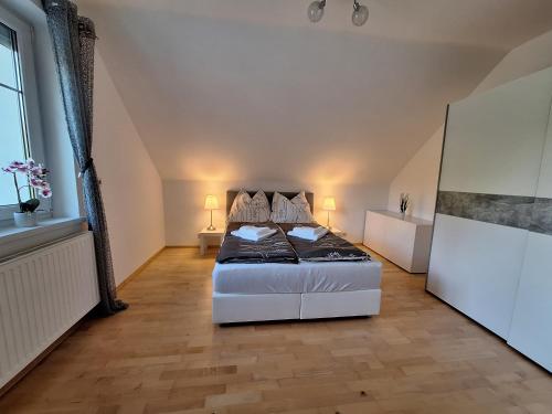 Postel nebo postele na pokoji v ubytování Ferienhaus Wolfi