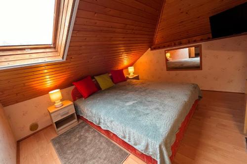 Postel nebo postele na pokoji v ubytování RELAX13 Vendégház