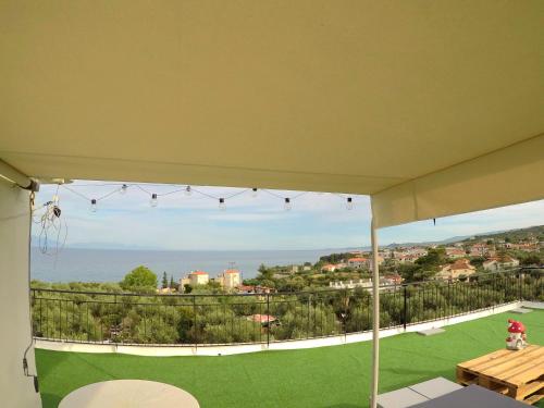 a view of the ocean from the balcony of a house at Blue Diamond in Chrani