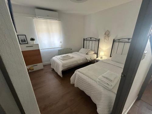 Posteľ alebo postele v izbe v ubytovaní Casa Mencía