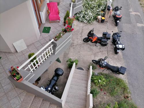 an overhead view of motorcycles parked next to a house at Stella Del Sud in Cuglieri