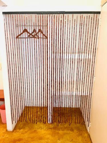 a corrugated iron fence in a room at Casa de las Olas Surf & Beach Club in Acapulco