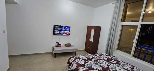 Imagen de la galería de Cozy room with sharing washroom, en Abu Dabi