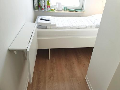 Ένα ή περισσότερα κρεβάτια σε δωμάτιο στο Aparthotel Sanni