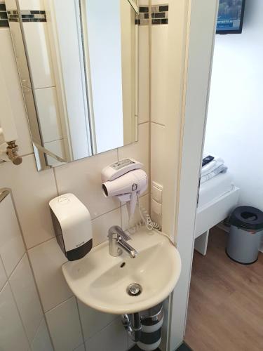 Ένα μπάνιο στο Aparthotel Sanni