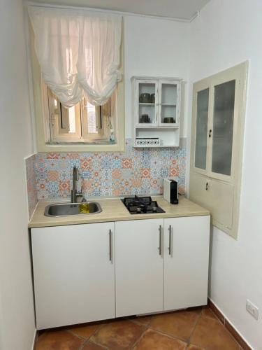 Kuchyň nebo kuchyňský kout v ubytování Casa Le Moire