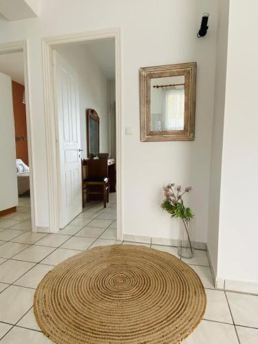 a large rug on the floor of a hallway at Nereides Apartments in Agios Gordios