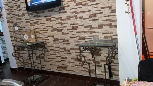 Μια τηλεόραση ή/και κέντρο ψυχαγωγίας στο Apartamento Andalous