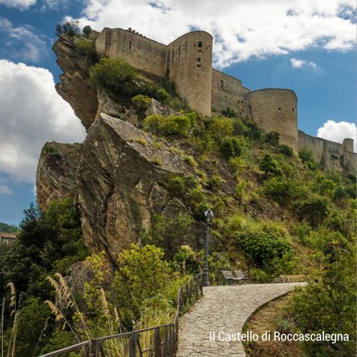 a castle on a hill with a staircase at IL GLICINE CAMPAGNOLO in Atessa