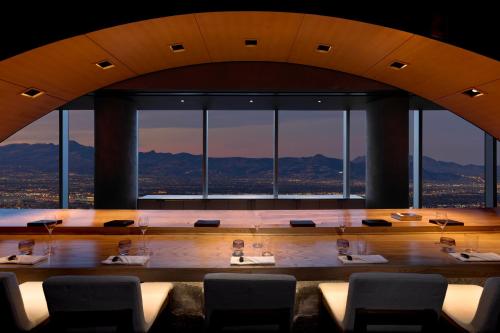 a group of people doing yoga in a room with a view at Fontainebleau Las Vegas in Las Vegas