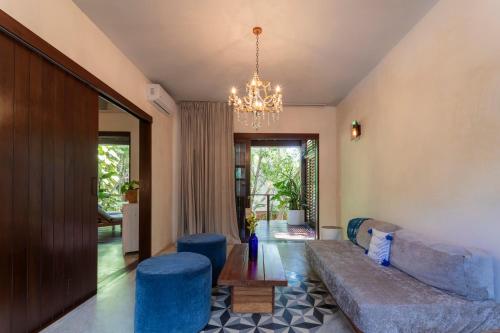 Гостиная зона в Lula Tulum, a Small Luxury Hotel