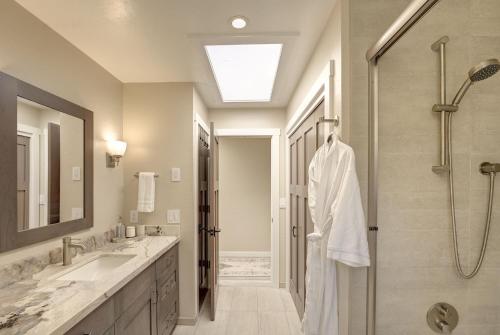 a bathroom with a shower and a sink at 3930 Bella Casa condo in Moss Landing