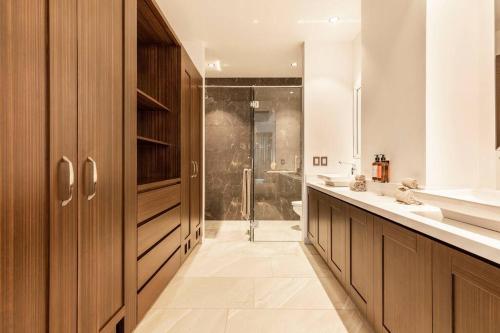 a bathroom with a shower and a sink and a toilet at Urban by Pardela in Puerto Vallarta