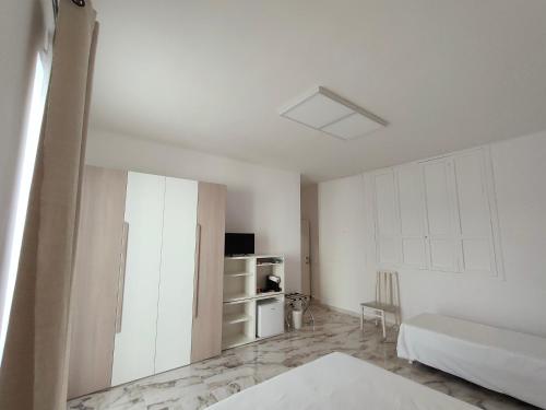 Ένα ή περισσότερα κρεβάτια σε δωμάτιο στο BlaBla Casa Mia