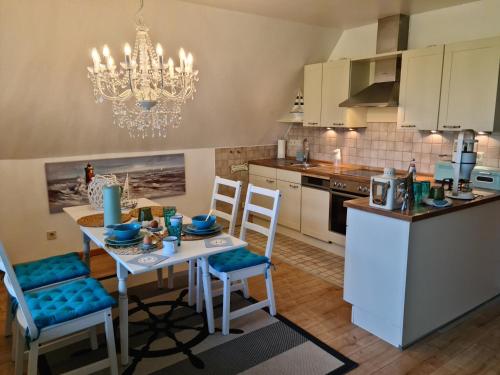 Kuchyň nebo kuchyňský kout v ubytování Ferienwohnung op de Warft