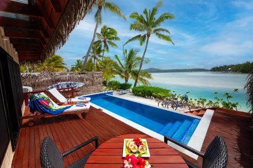 a view of the ocean from the deck of a villa at Aitutaki Lagoon Private Island Resort (Adults Only) in Arutanga