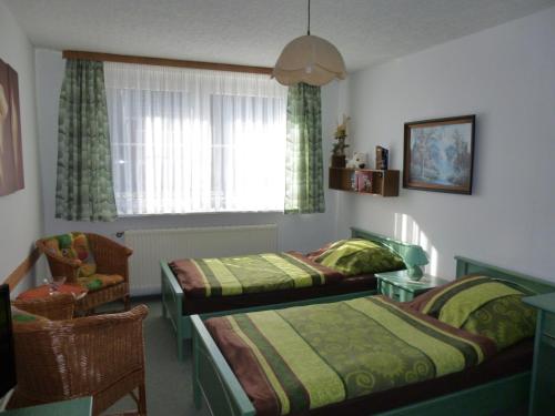 Katil atau katil-katil dalam bilik di Pension am Peeneufer UG