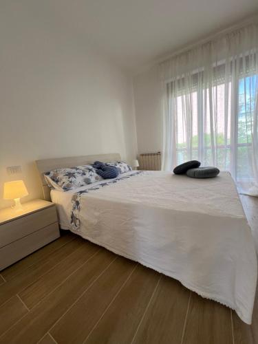 Ένα ή περισσότερα κρεβάτια σε δωμάτιο στο La casa di Arianna