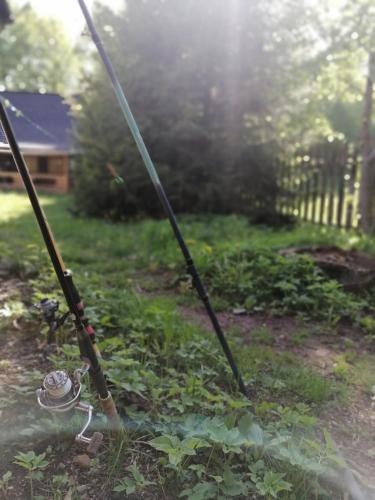 a couple of fishing poles in a yard at Stara Khata Карпати in Sheshory
