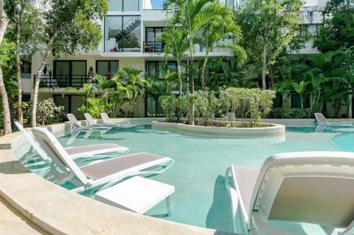 アクマルにあるLUXE 1-BR Condo in Bahia Principe - Multiple Poolsのギャラリーの写真