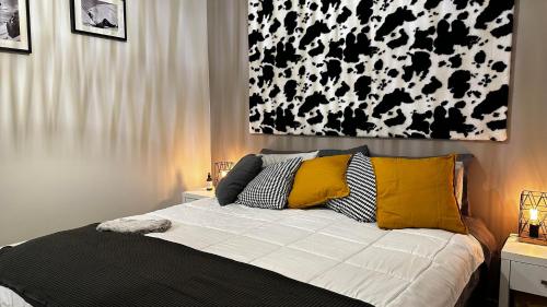 Una cama o camas en una habitación de Higgi Drive 5