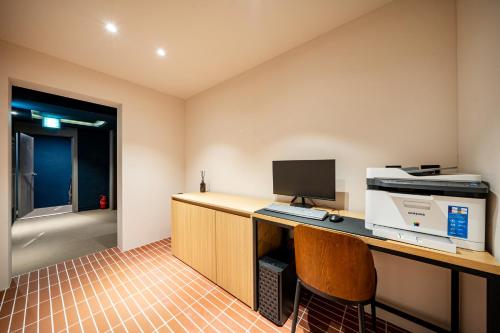 Hound Hotel Gumi indongにあるテレビまたはエンターテインメントセンター