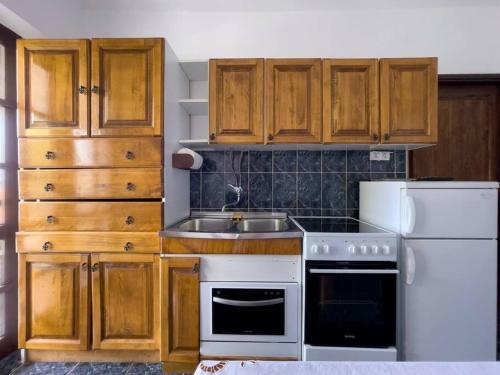 Η κουζίνα ή μικρή κουζίνα στο Apartment w/ spacious terrace