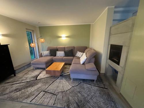 Posezení v ubytování Modernes Ferienhaus in Üdersdorf