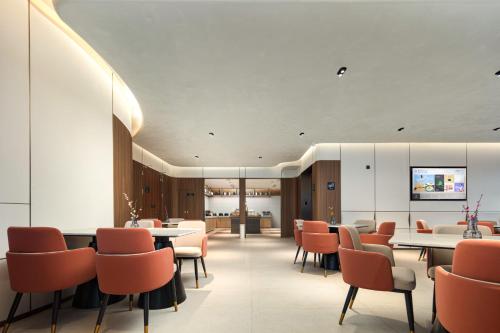 Μια τηλεόραση ή/και κέντρο ψυχαγωγίας στο Atour Hotel Ningbo Cixi Ancient Town