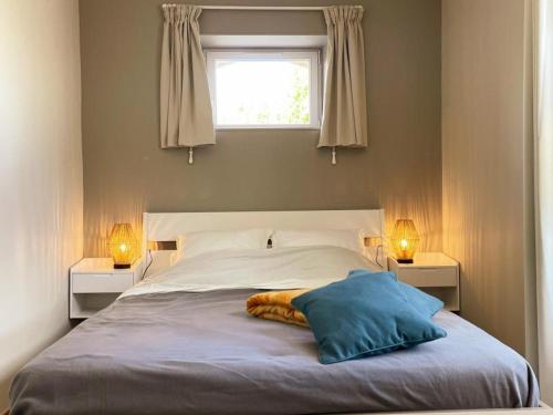 Ένα ή περισσότερα κρεβάτια σε δωμάτιο στο Gîte cosy avec terrasse privative, parking et WiFi - FR-1-491-443