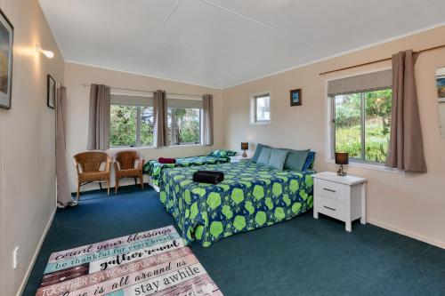 พื้นที่นั่งเล่นของ Sandy Cottage - Tokerau Beach Holiday Home