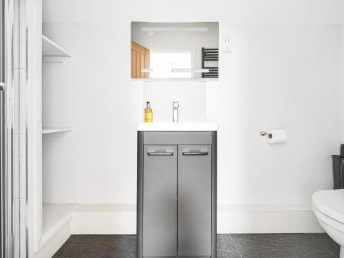 Koupelna v ubytování Hazel - Woodland Cottages