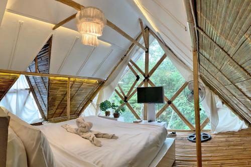 Ένα ή περισσότερα κρεβάτια σε δωμάτιο στο The New Ahmad Lodge and Garden View