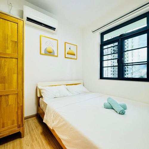 Кровать или кровати в номере Cozy 2B1R 6pax Condo Forest City 4C-1102