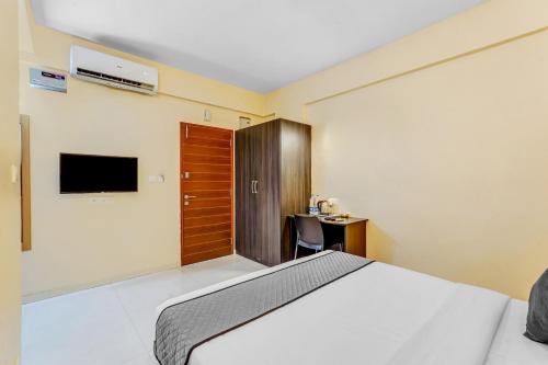 Postel nebo postele na pokoji v ubytování UPAR Hotels Nearby Bagmane Tech Park