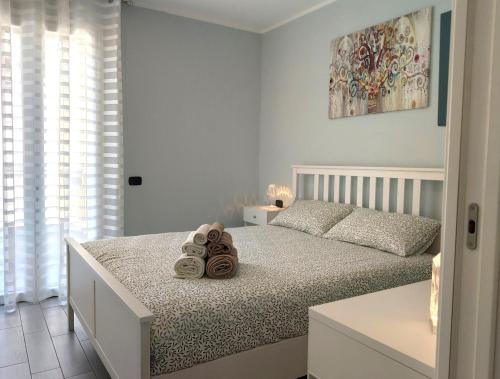 Un pat sau paturi într-o cameră la Matthias Home - Milan - modern and cozy flat, close to the metro