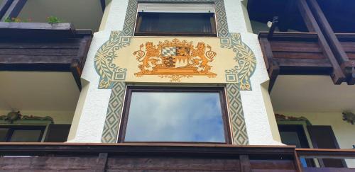 a large window on the side of a building at Alpenhotel Gastager in Inzell