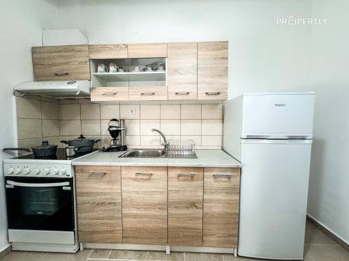 Η κουζίνα ή μικρή κουζίνα στο Areti's Family House