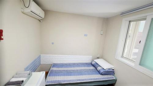 Llit o llits en una habitació de Hongdae guesthouse Cocon Stay - Female only
