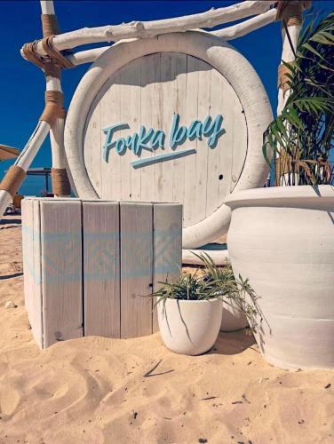 aiki bay sign in the sand on a beach at Fouka bay chalet at north coast, Egypt in Marsa Matruh
