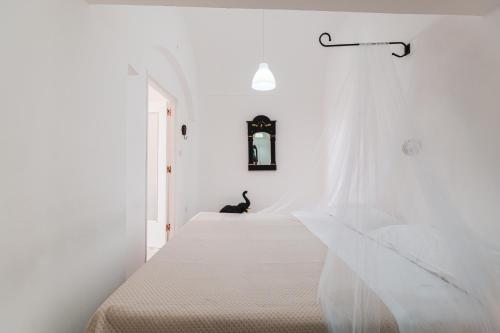 Voodi või voodid majutusasutuse Casa Gino toas