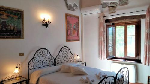 Postel nebo postele na pokoji v ubytování Agriturismo Grossola