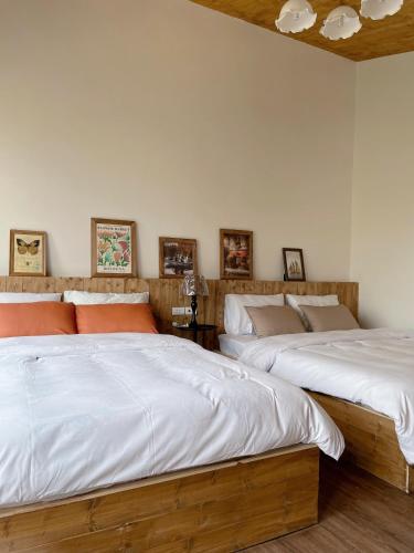 Postel nebo postele na pokoji v ubytování Retro House Mộc Châu