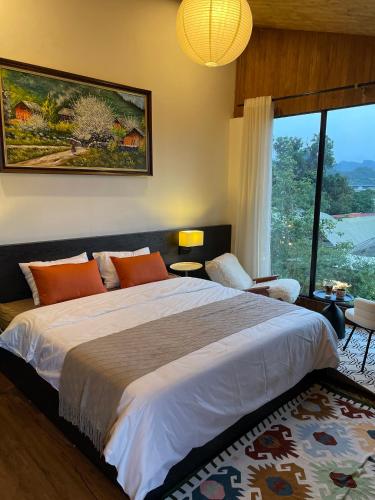 Postel nebo postele na pokoji v ubytování Retro House Mộc Châu