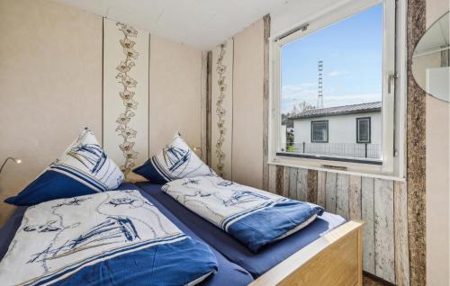 Ein Bett oder Betten in einem Zimmer der Unterkunft Bungalow Anker