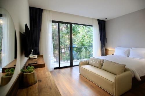 Postel nebo postele na pokoji v ubytování DD Hospitality - Mi Amor Da Lat