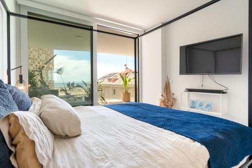 Ένα ή περισσότερα κρεβάτια σε δωμάτιο στο Apartment Wave