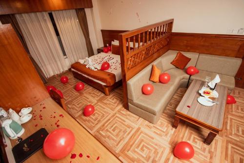 an overhead view of a living room with red balloons at Mount View Pokhara in Pokhara